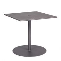The Woodard Commercial Solid Iron Top Pedestal Base Square Bistro Table highlighting the durable square solid iron top designed for a high-traffic commercial setting.