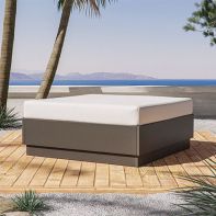 Commercial all-weather modular patio ottoman and extra seating bench for resort and hospitality pool decks.